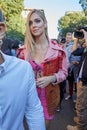 Chiara Ferragni with pink clothing before Prada fashion show, Milan Fashion Week street style on September