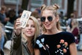 Chiara Ferragni selfie with a fan after Fendi fashion show, Milan Fashion Week street style on September 22