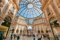 Galleria Vittorio Emanuele interior with people and luxury shops in Milan Royalty Free Stock Photo