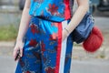 Woman blue, red, satin floral with before Fendi fashion show, Milan Fashion Week street style on September