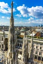 Milan skyline view from Milan Cathedral Duomo di Milano rooftop on a sunny day