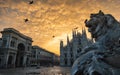 Milano piazza duomo cathedral galleria and lionmonument at sunrise cloudy sky Royalty Free Stock Photo