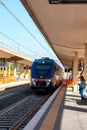 MILAZZO, SICILY, Italy - 03 October 2023. A Trenitalia train arriving at Milazzo station for onward journey to Palermo Central