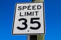 A 35 mile per hour speed limit sign with a blue sky background in Douglasville Royalty Free Stock Photo