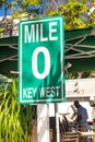 Mile Zero Key West road sign surrounded by vegetation