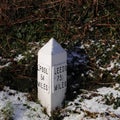 Milepost marker on the Leeds Liverpool canal. Royalty Free Stock Photo