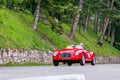 1000 Miles 2019, Brescia - Italy. May 15, 2019: The historic Mille Miglia car race. A couple rushing in a beautiful red vintage