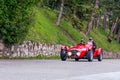 1000 Miles 2019, Brescia - Italy. May 15, 2019: The historic Mille Miglia car race. A couple rushing in a beautiful red vintage