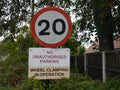 20 miles per hour road sign in surrey england Royalty Free Stock Photo