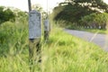 Milestone and road with grass