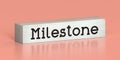 Milestone - word on wooden block Royalty Free Stock Photo