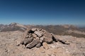 Milestones atop the 3144m Taillon Peak with Vignemale Peak in the background Royalty Free Stock Photo