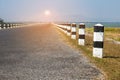 Milestones, black and white milestones with green grass roadside,