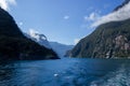 Milford Sound on a ferry on a beautiful blue sky day, Fiordland, South Island,New Zealand