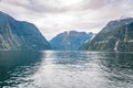 Milford Sound Piopiotahi is a famous attraction in the Fiordland National Park, New Zealand`s South island Royalty Free Stock Photo