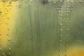 Militaristic background. Old metal surface of an airplane fuselage with khaki rivets