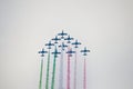 Military aircraft drawing green white red flag in the sky Royalty Free Stock Photo