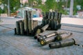 Military ammunition, package of used metal cartriges on a wooden table Royalty Free Stock Photo