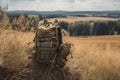 military backpack in field, with view of expansive landscape