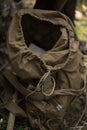 Military backpack stands on the ground uncovered Royalty Free Stock Photo