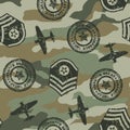 Military badges in a seamless pattern