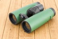 Military binocular on the wooden table, 3D Royalty Free Stock Photo