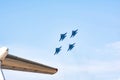 Airplane wing and military fighters in the sky. Aviation in action Royalty Free Stock Photo