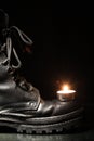 Military Boot And Candle