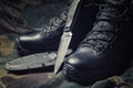 Military boots. The concept of war, veterans, fallen fighters. Sale of military shoes