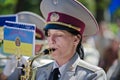 Military brass band. Female saxophone, performer