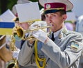 Military brass band. A man playing the trumpet