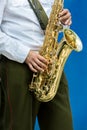 Military brass band musician with saxophone in his hands Royalty Free Stock Photo