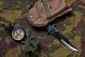 Military camo pants, compass and knife Royalty Free Stock Photo