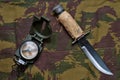 Military camo pants, compass and knife Royalty Free Stock Photo