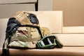 Military camouflaged armored helmet with covers and soldier googgles