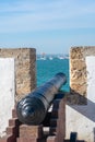 Military cannon in the wall of Cadiz, Andalusia. Spain.