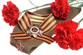 Military cap, order of Great Patriotic war, flowers, Saint George ribbon Royalty Free Stock Photo