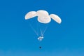 Military cargo parachute flying in the sky.