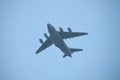 Military cargo plane flying over Royalty Free Stock Photo