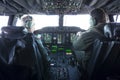 Military carrier airplane cockpit and pilots