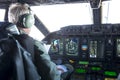 Military carrier airplane cockpit and pilots