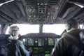 Military carrier airplane cockpit and pilots