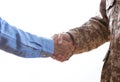 Military and civilian shaking hands standing on white background