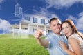 Military Couple Holding House Keys with Ghosted House Drawing Be Royalty Free Stock Photo