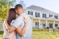 Military Couple Looking at Nice New House Royalty Free Stock Photo