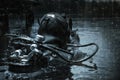 Military diver emerges from under the water and takes aim from the machine gun. The concept of special military operations, wars,