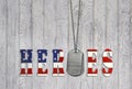 Military dog tags with hero flag Royalty Free Stock Photo