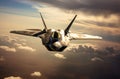 Military F 22 fighter jet flying in sky Royalty Free Stock Photo