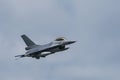 Military F16 fighter jet close up flying through the air. Royal Netherlands Air Force F16 fighter jet aircraft taking off. Royalty Free Stock Photo