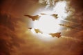 Military F 16 fighter jet flying through a stormy sky Royalty Free Stock Photo